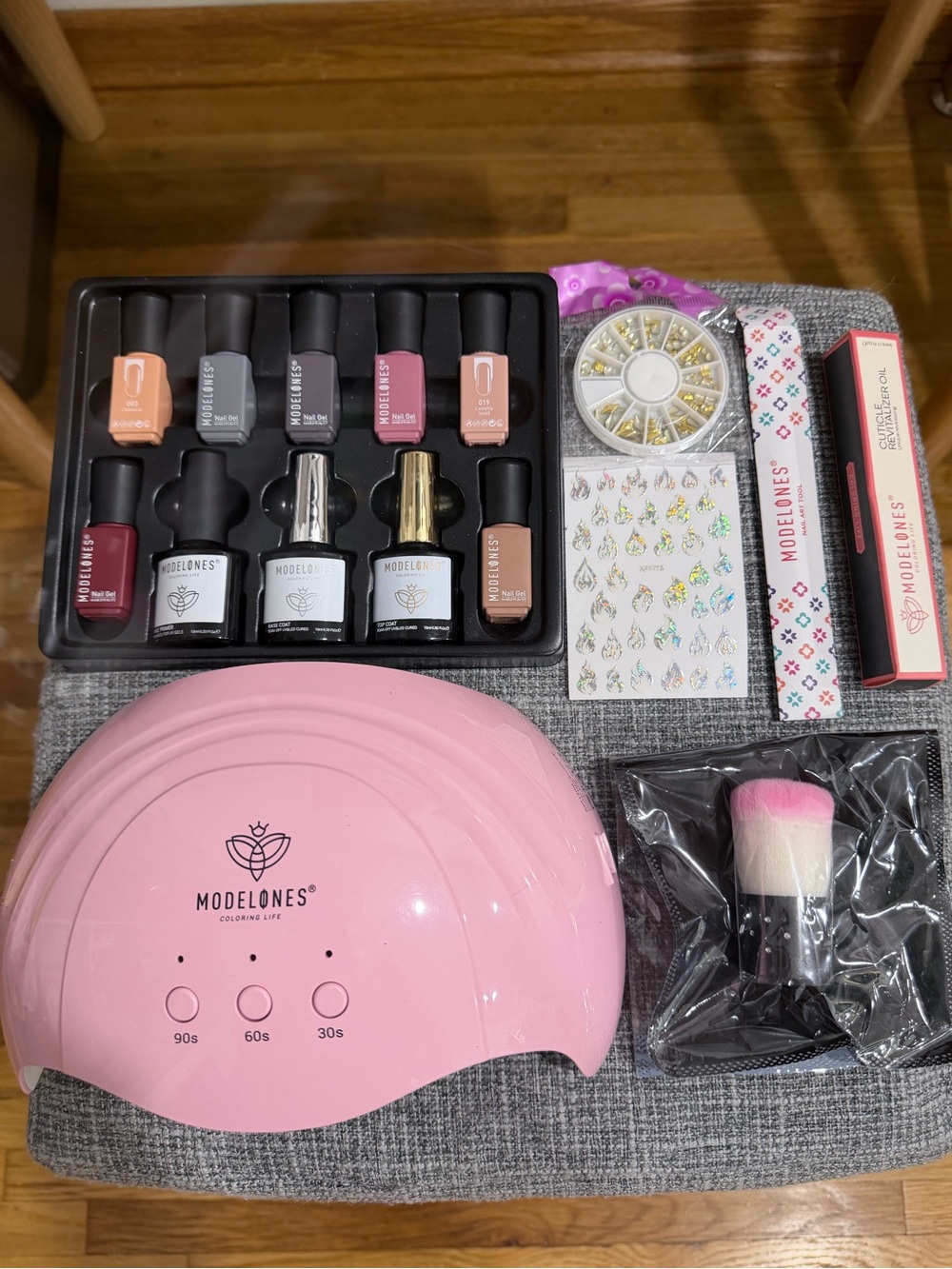 Modelones Pink LED Gel Nail Kit with Assorted Gel polishes.